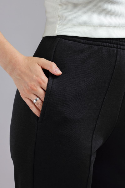 Брюки женские из трикотажа с отстрочкой и карманами Mirolia 1191 чёрный - фото 5