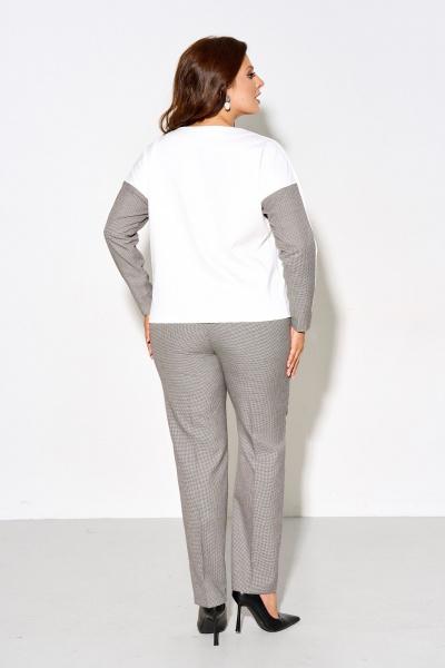 Черное платье из струящейся ткани с декоративным вырезом и кружевом IVA 1623 - фото 2