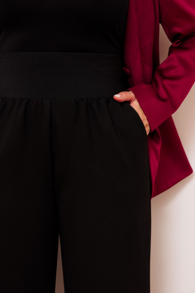 Женские брюки из трикотажа с широкой резинкой по талии AMUARt 1024 черный - фото 7