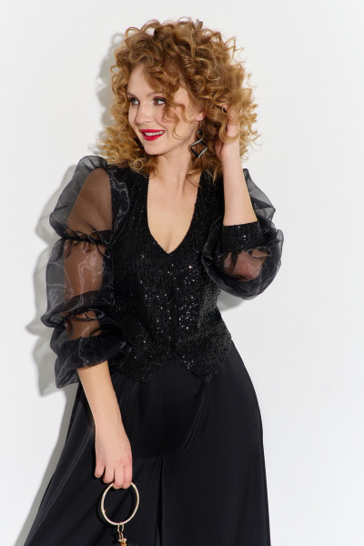 Нарядный костюм из трикотажа с блузой и брюками-юбкой Euromoda 574 - фото 4