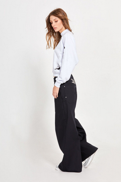 Джегинсы расклешенные из джинса с вышивкой и кожаной аппликацией Rivoli 5237 - фото 9